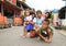 Kids posing on street of Manado