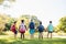 Kids posing together during a sunny day at camera