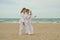 Kids practicing Aikido on the beach