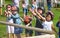 Kids practicing with the catapult in the Norman village. Reconstruction of medieval period 1050, educational centre for kids with