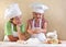 Kids preparing the dough for a cookie