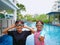 Kids ready for swimming at the swimming pool.