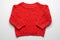 Kids red knitted sweater with pattern. Front view