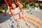 Kids riding on colorful amusement carousel