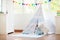 Kids room with teepee tent. Child bedroom