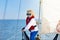 Kids sail on yacht in sea. Child sailing on boat.