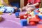 Kids, sibling boy and girl plays at home with toys, wooden building blocks, during quarantine self isolation covid-19