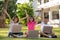 Kids smiling and raised hand on learning outdoor in class of school