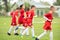 Kids soccer football - children players exercising before match