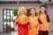 Kids in sportswear standing with a ball and looking enjoyed