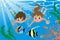 Kids swimming underwater