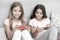 Kids taking selfie. Smartphone application concept. Girlish leisure pajama party. Girls smartphone little bloggers
