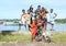 Kids and teens posing on bank of sea in Manokwari