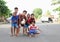 Kids and teens posing on street in Manado
