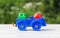 kids toy train made of plastic outdoors in the summer