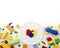Kids toys frame with colorful mosaic shape of heart and plastic blocks on white background .