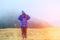 Kids travel - little boy with binoculars hiking in mountains