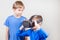 Kids trying VR glasses.