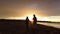 Kids walking on Tsilivi beach at dusk