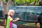 Kids watch penguin at zoo. Child at safari park