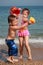 Kids watering on the beach