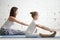 Kids yoga teacher training with a child a paschimottanasana pose