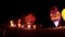 KIEL, GERMANY - JUNI 22, 2016: Glowing Hot Air Balloons in the Night Glow on the 10. International Balloon Sail in Kiel, Germany