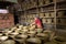 Kien Giang, Vietnam - Dec 6, 2016: Vietnamese woman making clay pots - pottery product by hands in Hon Dat district, Kien Giang pr