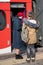 Kiev railway station. The conductor checks the documents and tickets of passengers before boarding the train.