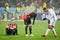 KIEV, UKRAINE - December 12, 2018: Frustrated soccer players sit on the lawn during the UEFA Champions League match between