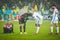 KIEV, UKRAINE - December 12, 2018: Frustrated soccer players sit on the lawn during the UEFA Champions League match between