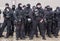 Kiev, Ukraine - January 18th: Ukrainian policemen in black uniforms on Mikhailovskaya Square are guarding the order