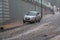 Kiev, Ukraine - July 01, 2017: Streams of water in heavy rain on Andreevsky Descent