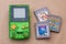 Kiev, Ukraine - June 04, 2020: Nintendo Game Boy Color 1998 with cartridges, special edition, popular handheld video game device,