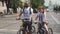 Kiev/Ukraine-June,1 2019 Attractive cycling couple on bikes. Good looking girl and boy standing at bike parade. Cute cycling coupl