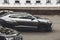 Kiev, Ukraine - June 12, 2021: Black luxury super SUV Lamborghini Urus Topcar Design in motion. Lamborghini Urus SSUV on the road