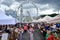 KIEV, UKRAINE - MAY 19, 2018: The traditional street fair of a variety of natural organic products. Ferris wheel