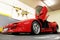 Kiev, Ukraine - May 22, 2021: Red luxury supercar Lamborghini Diablo Koenig with open door. Exclusive red supercar in the