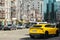Kiev, Ukraine - May 22, 2021: Yellow luxury super SUV Lamborghini Urus in the city. Lamborghini Urus SSUV