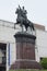 Kiev, Ukraine - May 29, 2016: Monument to Soviet military leader Shchors with an inscription painted on a pedestal `Executioner of