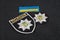 KIEV, UKRAINE - NOVEMBER 22, 2016. Patch and badge of the National Police of Ukraine on black uniform background