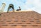 KIEV - UKRAINE, OCTOBER - 18, 2016: Roofing Contractors Install New House Roofing with Asphalt Shingles.