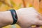 Kiev, Ukraine - September 25, 2019: Smart watch, fitness bracelet Xiaomi Mi Band 4. On the arm with an open menu