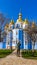 Kiev - Young man standing in front of St Michael`s Golden-Domed Cathedral