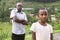 KIGALI, RWANDA - SEPTEMBER 6, 2015: Unidentified man and girl. The Rwandan young girl.