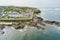 Kilkee, small coastal town, popular as a seaside resort, located in horseshoe bay and protected from the Atlantic Ocean by the