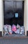 Kilkenny, Ireland, May, 10, 2019: Bags of clear plastic bags pile in a doorway which is a fire escape