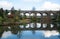 Kilver Court Gardens, Shepton Mallet, Somerset UK. Historic lakeside garden located beneath disused Victorian Charlton Viaduct