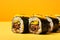 Kimbap tasty fast food street food for take away on yellow background