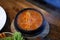 Kimchi Soup with tofu and pork belly served in clay pot, One of the most loved of all the stews in Korean cuisine